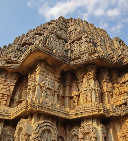 A Close up picture of the three dimensional carvings on the main sanctum of the heritage Shiva temple in Hosaholalu town in India.