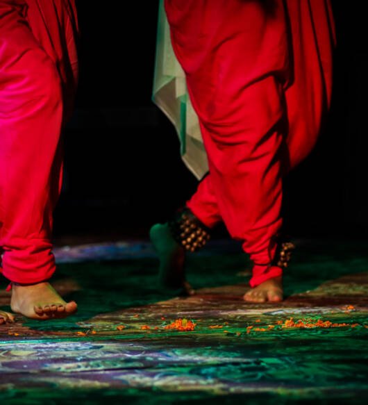 indian classical dance form in feet with musical anklet with selective focus and blur