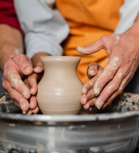 close-up-hands-doing-pottery