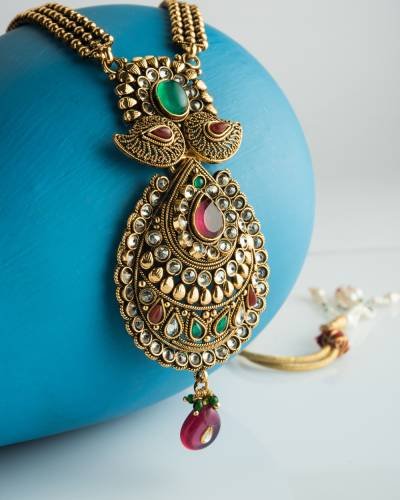 Indian traditional jewellery over wooden background, Selective focus Indian traditional jewellery over wooden background, Selective focus