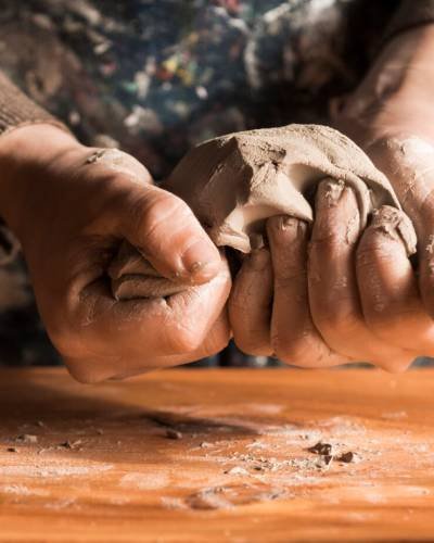 front-view-woman-shaping-clay_23-2148271055 front-view-woman-shaping-clay_23-2148271055
