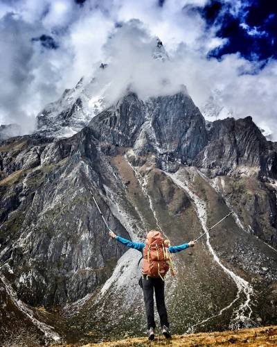 full-length-person-standing-mountain-against-sky full-length-person-standing-mountain-against-sky