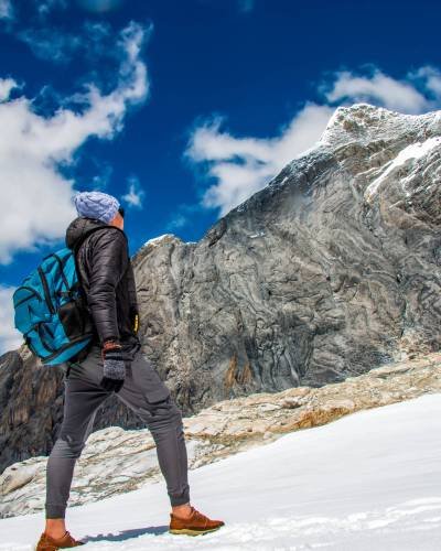 hiker-snowy-raura-oyon-peru-person-near-snowy-peak hiker-snowy-raura-oyon-peru-person-near-snowy-peak