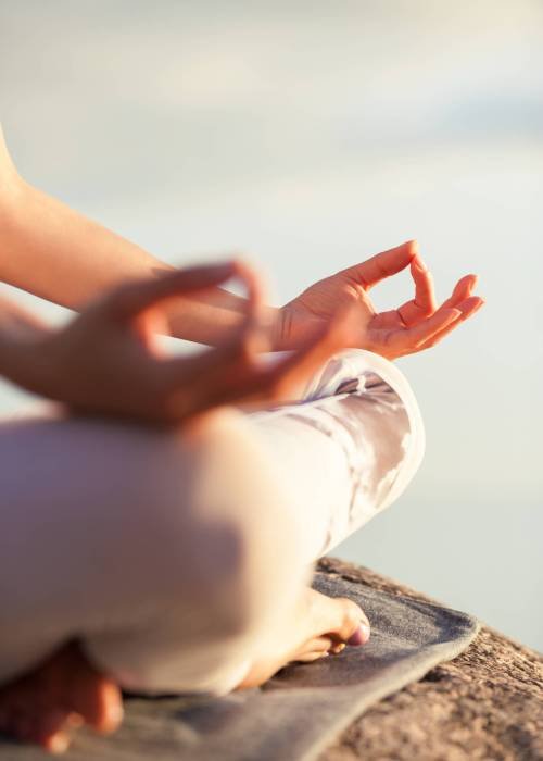 yoga woman meditating outdoors yoga woman meditating outdoors, close-up hands
